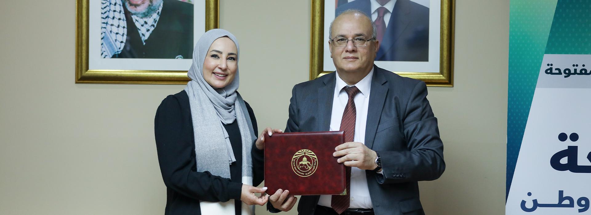 QOU and the Smart University College for Smart Education sign an academic partnership agreement 